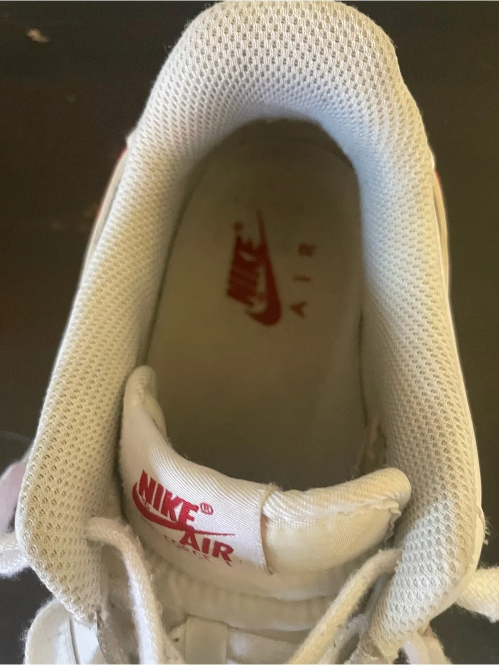 Nike Air Force 1 All-White Low Top Sneakers with Red Swoosh